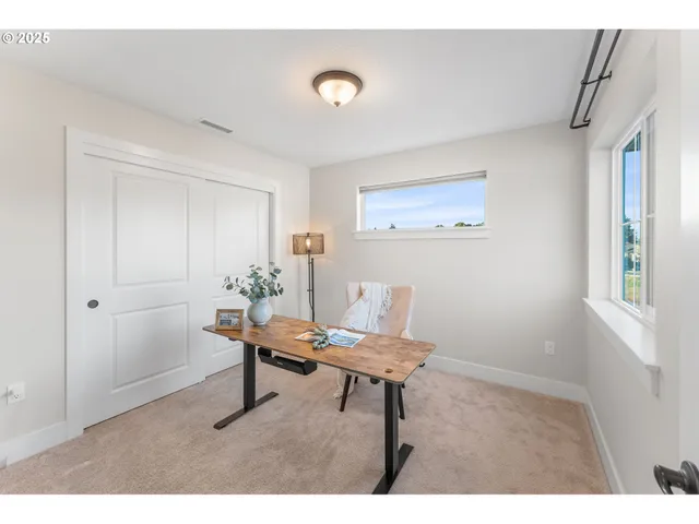 a room with furniture and a window