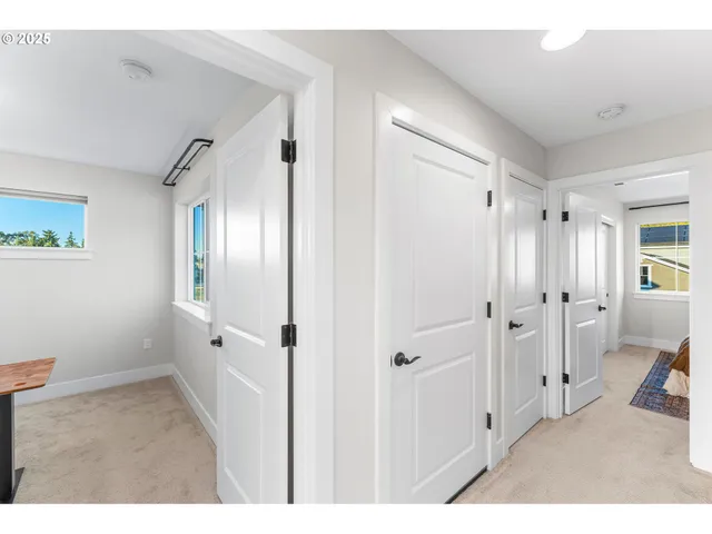 a bathroom with a shower and a glass door