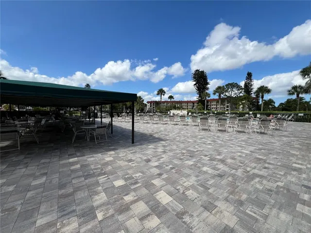 a view of a terrace with dining space