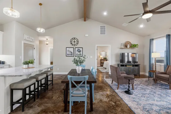 a view of a dining room with furniture