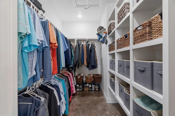 a living room with a couch and a window