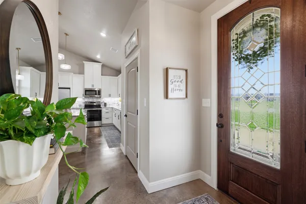 a living room with furniture and a window