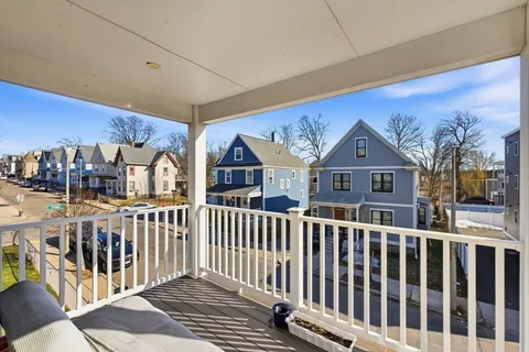 a front view of a house with glass windows