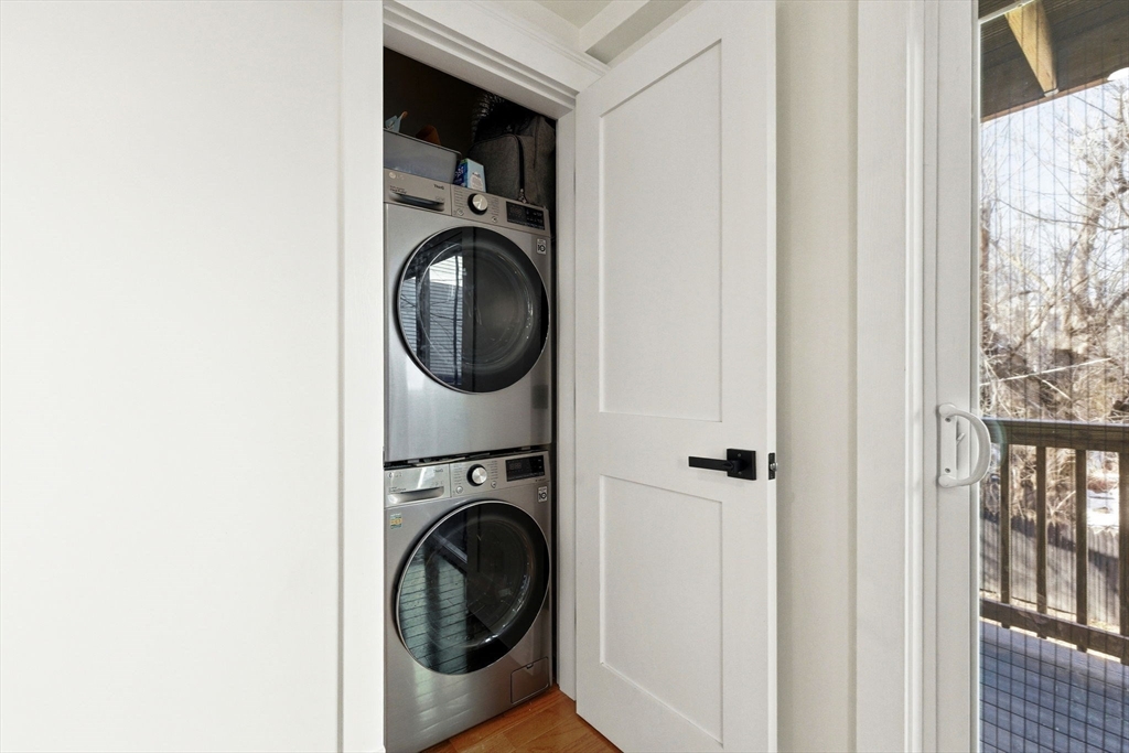 567 Park Street, Unit 2 Boston, MA 02124 - Photo 5 of 20 a utility room with dryer and washer