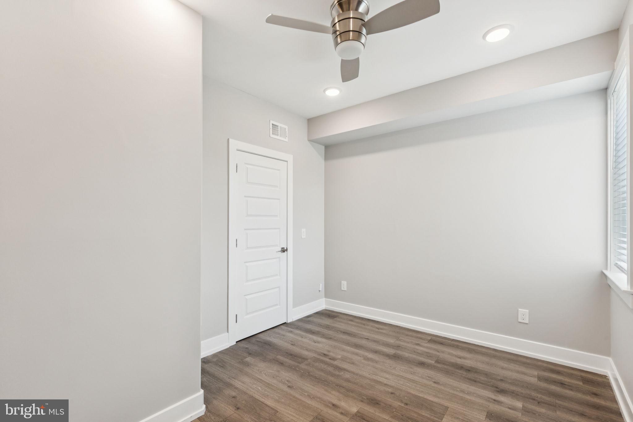 2531 North Front Street, Unit 2 Philadelphia, PA 19133 - Photo 14 of 25 wooden floor in an empty room