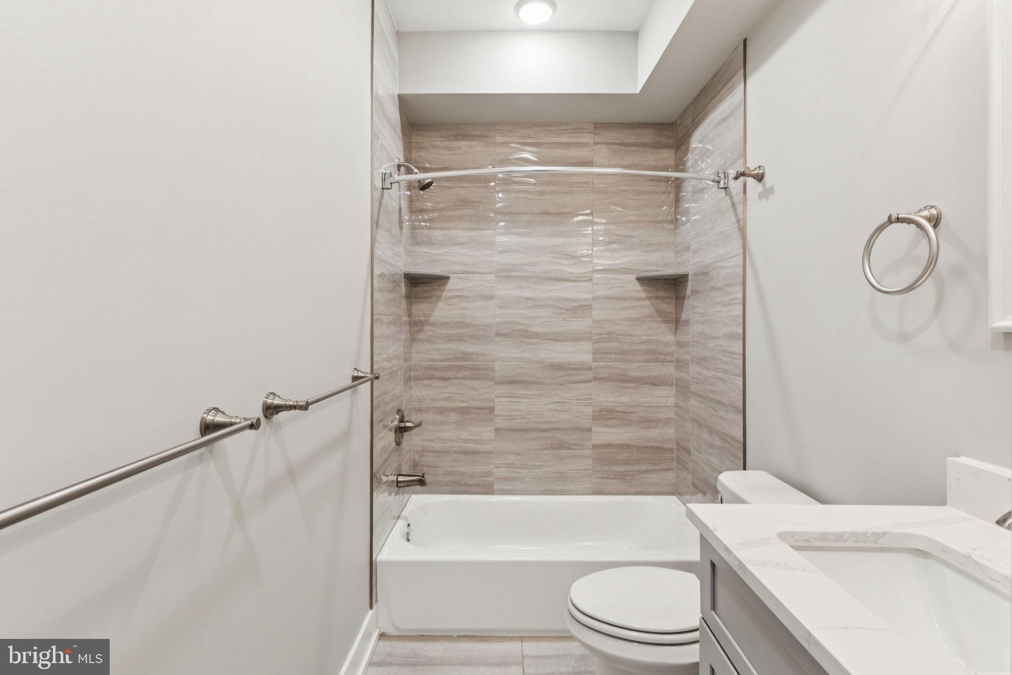 2531 North Front Street, Unit 2 Philadelphia, PA 19133 - Photo 17 of 25 a bathroom with a toilet and shower