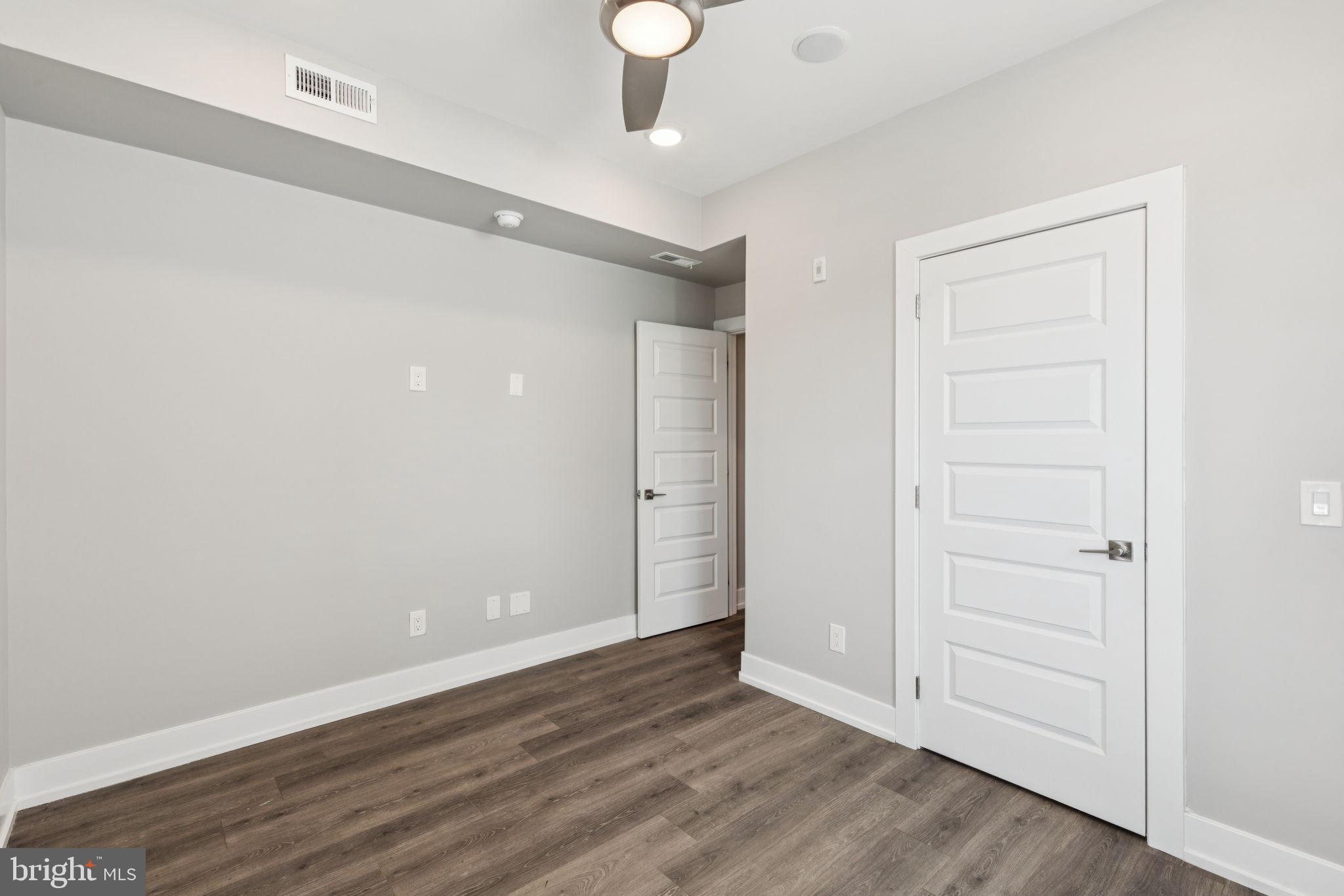 2531 North Front Street, Unit 2 Philadelphia, PA 19133 - Photo 22 of 25 wooden floor in an empty room