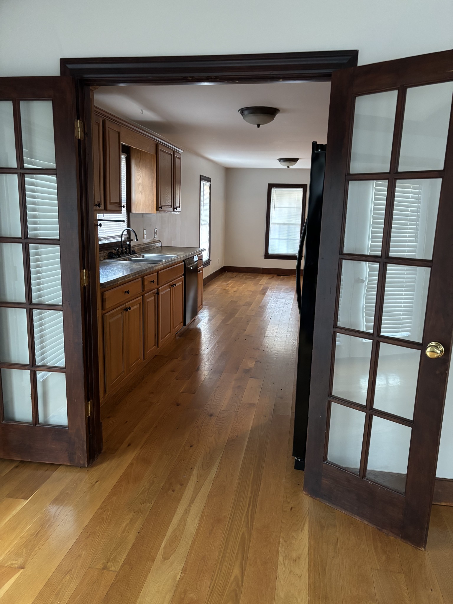 6315 Highway 49 East Springfield, TN 37172 - Photo 5 of 9 a view of a hallway and wooden floor and dining room