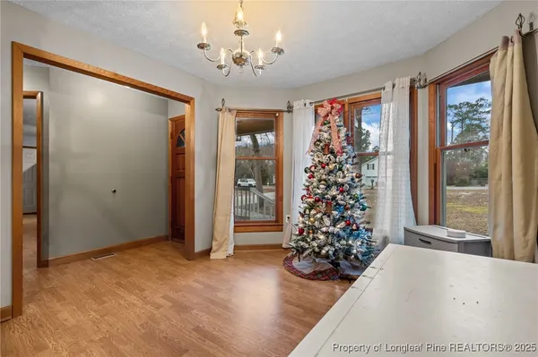 a view of entryway with window and furniture