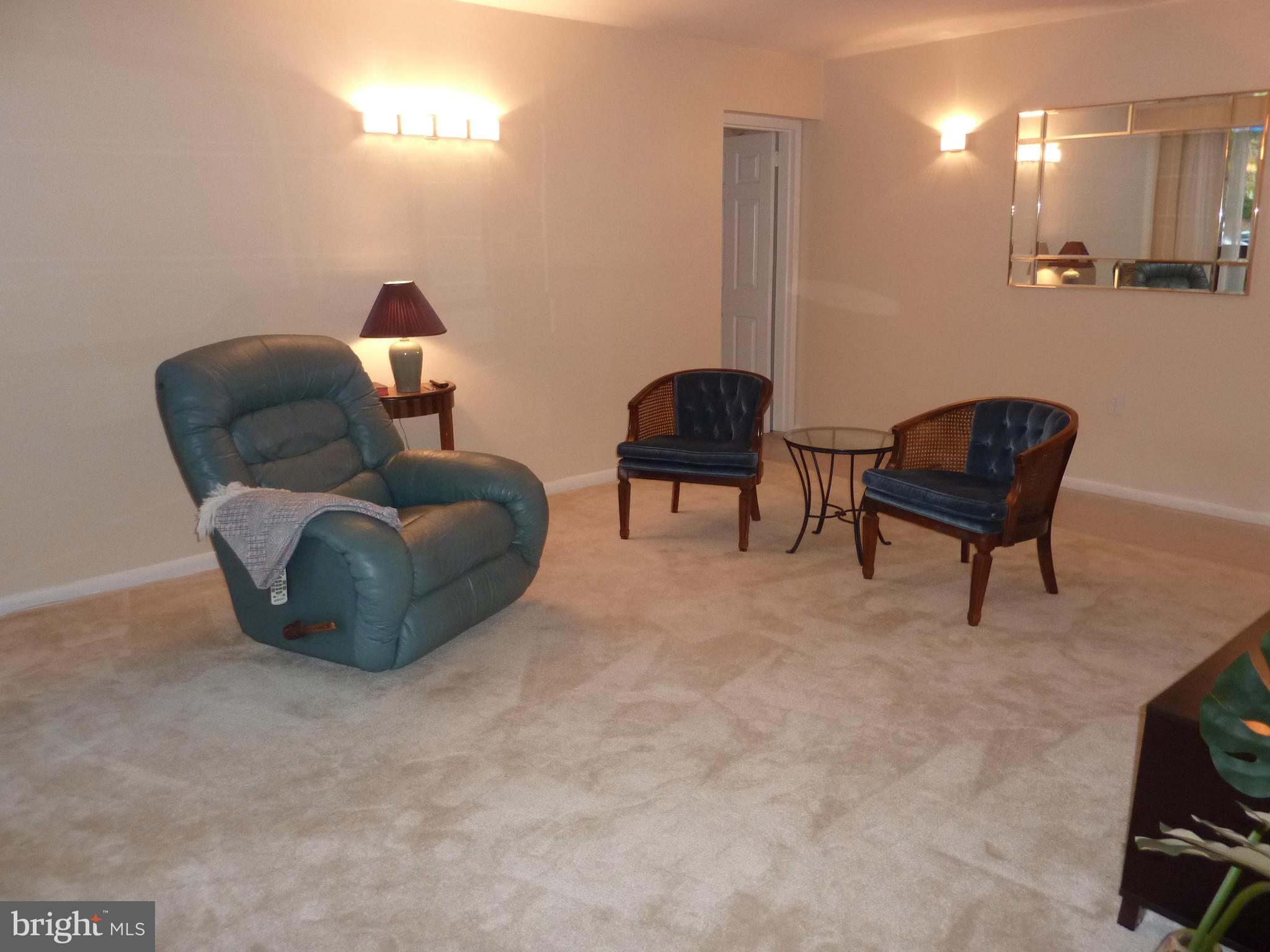 1418 Northgate Square, Unit 12C Reston, VA 20190 - Photo 8 of 19 Living Room has new light fixtures