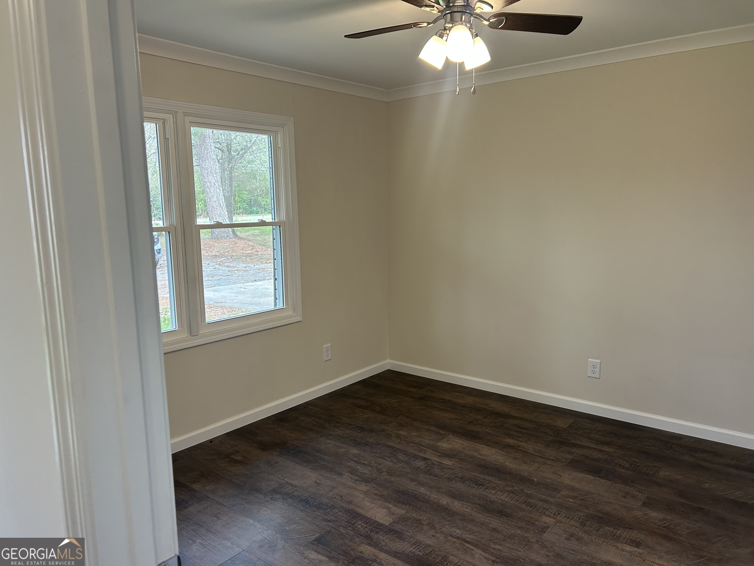 360 Warren Road Northeast Rome, GA 30165 - Photo 12 of 14 a view of wooden floor and chandelier fan in a room