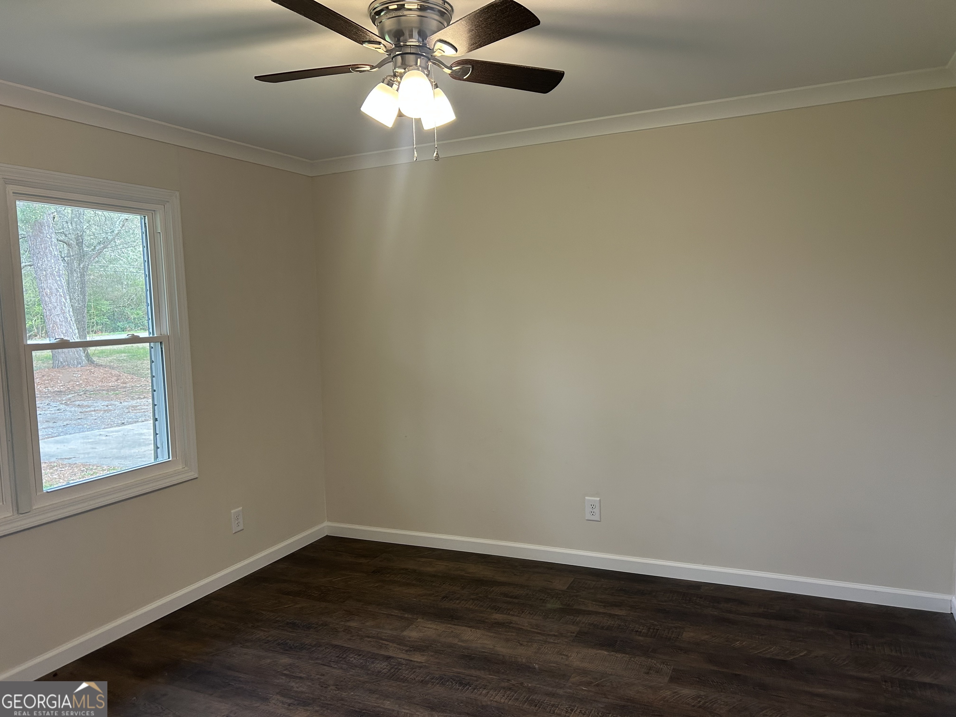 360 Warren Road Northeast Rome, GA 30165 - Photo 13 of 14 a view of an empty room with wooden floor and a window