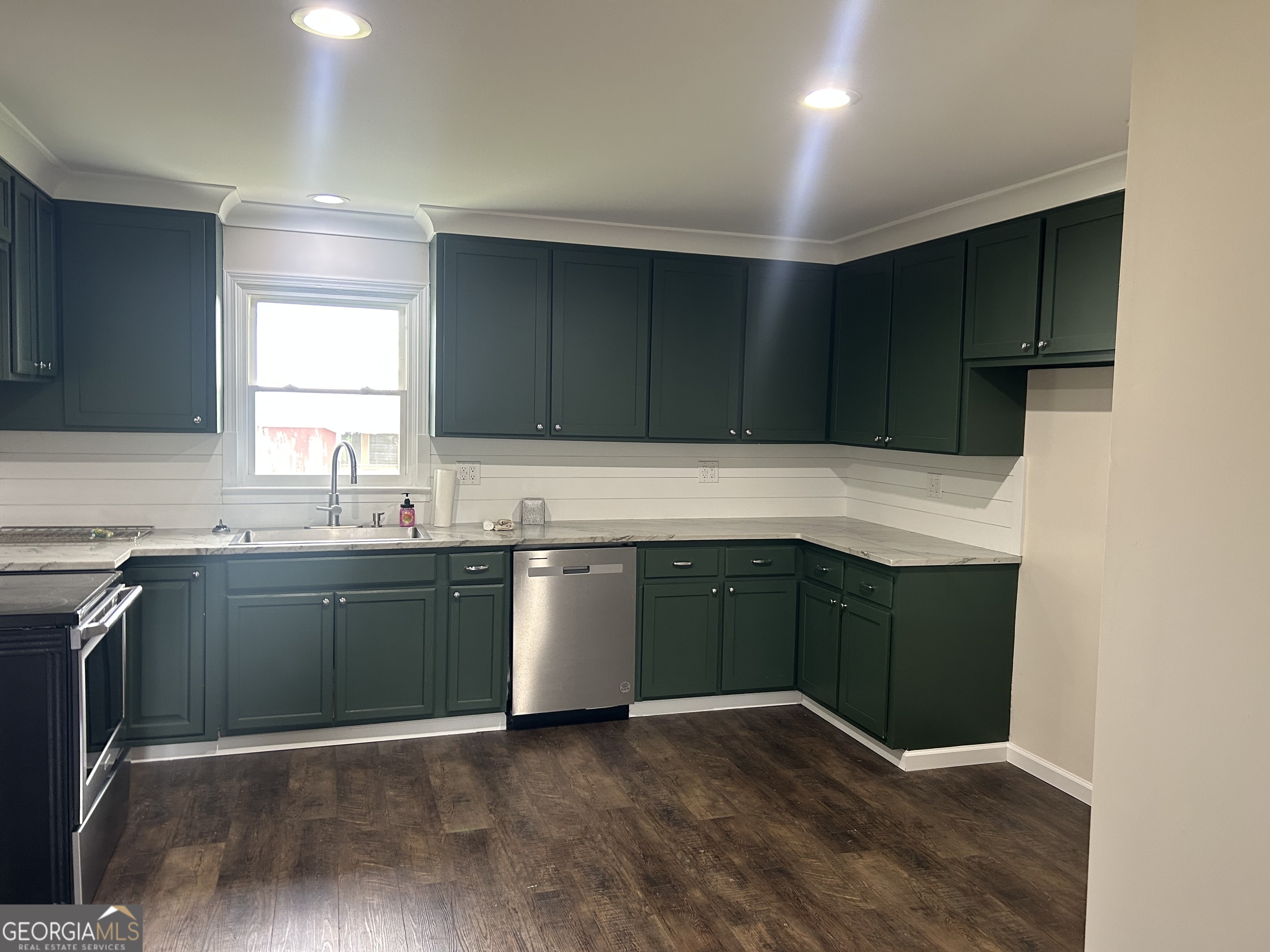 360 Warren Road Northeast Rome, GA 30165 - Photo 5 of 14 a kitchen with granite countertop cabinets and window