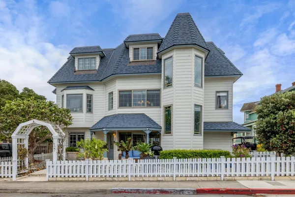 a front view of a house with a porch