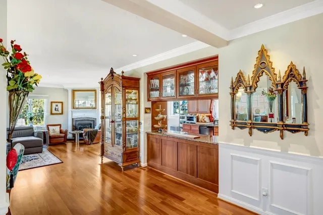 a very nice looking living room with a couch and a dining table
