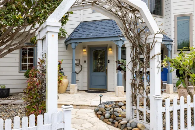 a front view of a house with a porch