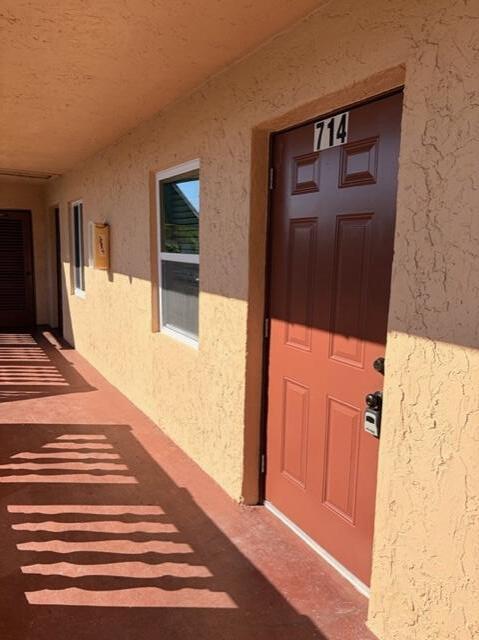 9374 Southwest 3rd Street, Unit 714 Boca Raton, FL 33428 - Photo 20 of 21 a view of a entryway door of the house