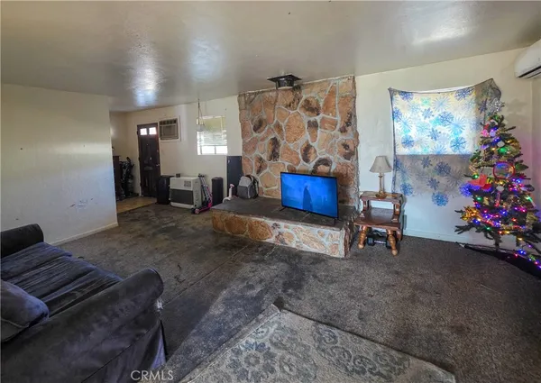 a living room with furniture and a couch