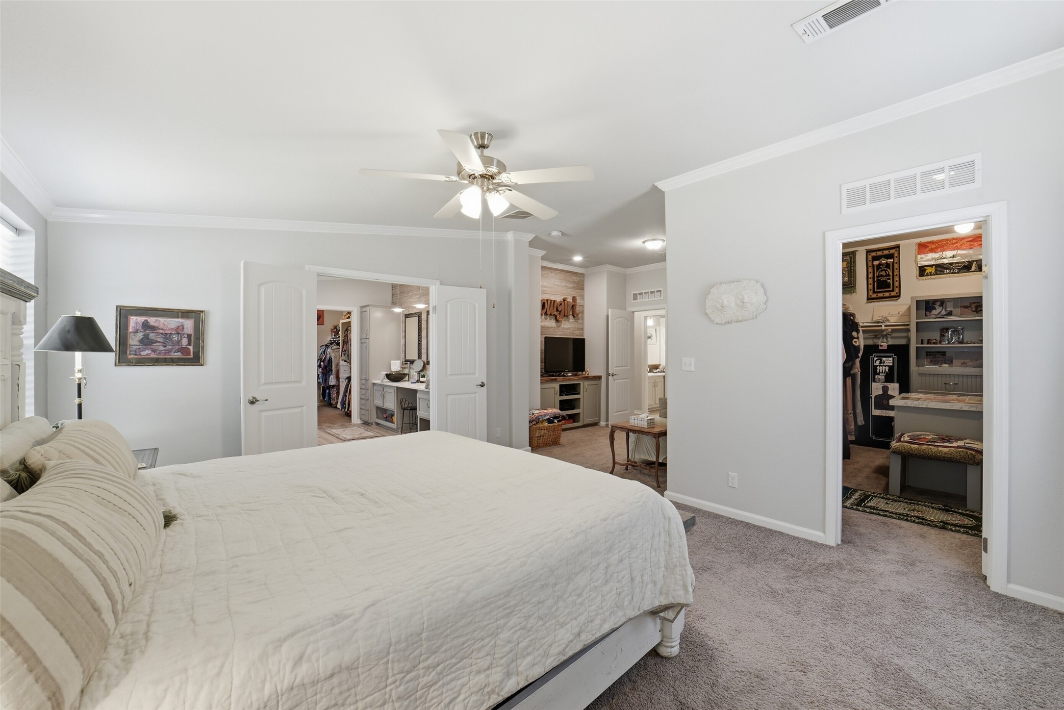 4007 Nancy Lane, Unit C546B Rosharon, TX 77583 - Photo 31 of 50 a bedroom with a large bed and a chandelier