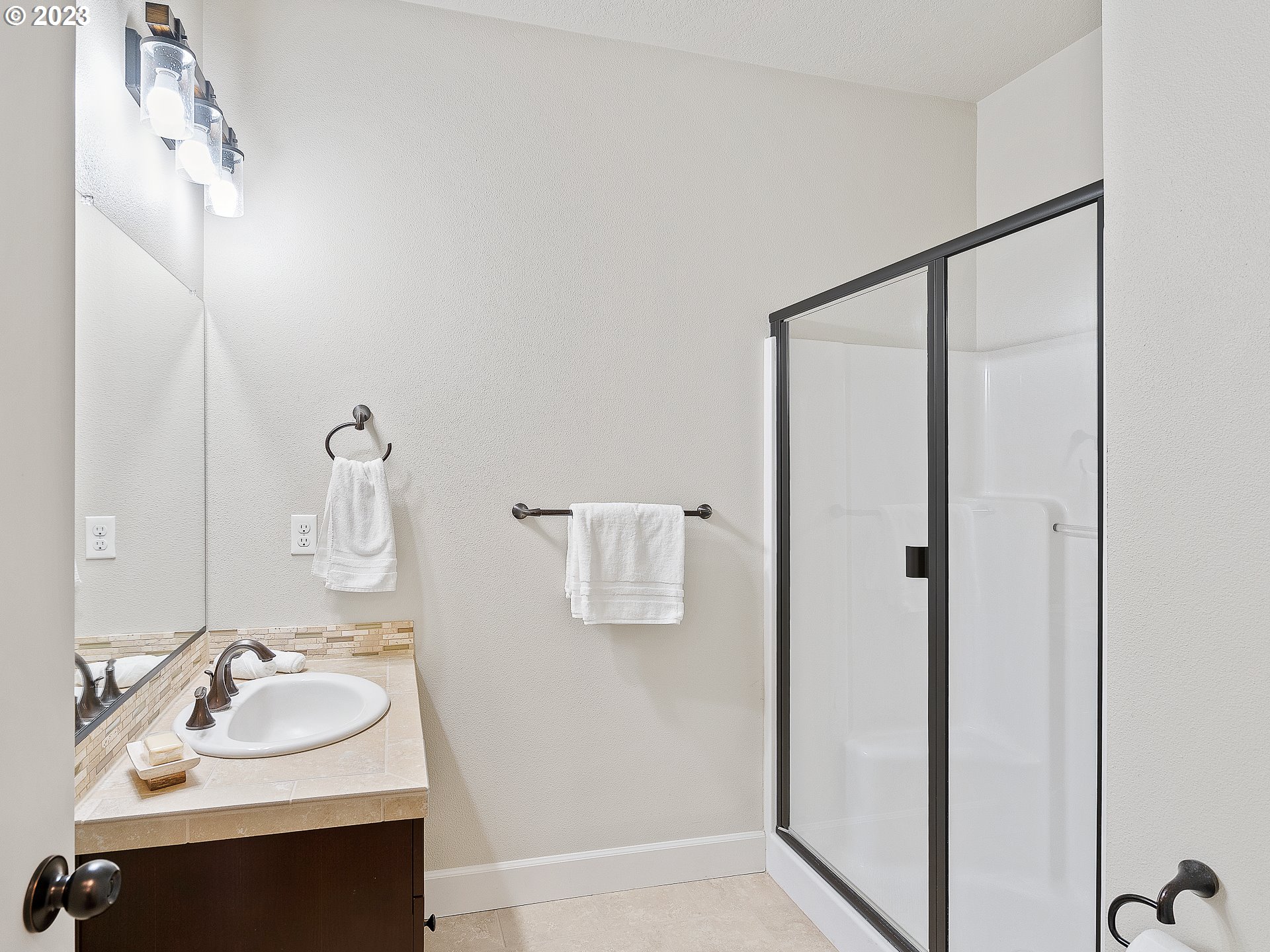 5420 Northwest 15th Circle Camas, WA 98607 - Photo 11 of 29 a bathroom with a sink and mirror