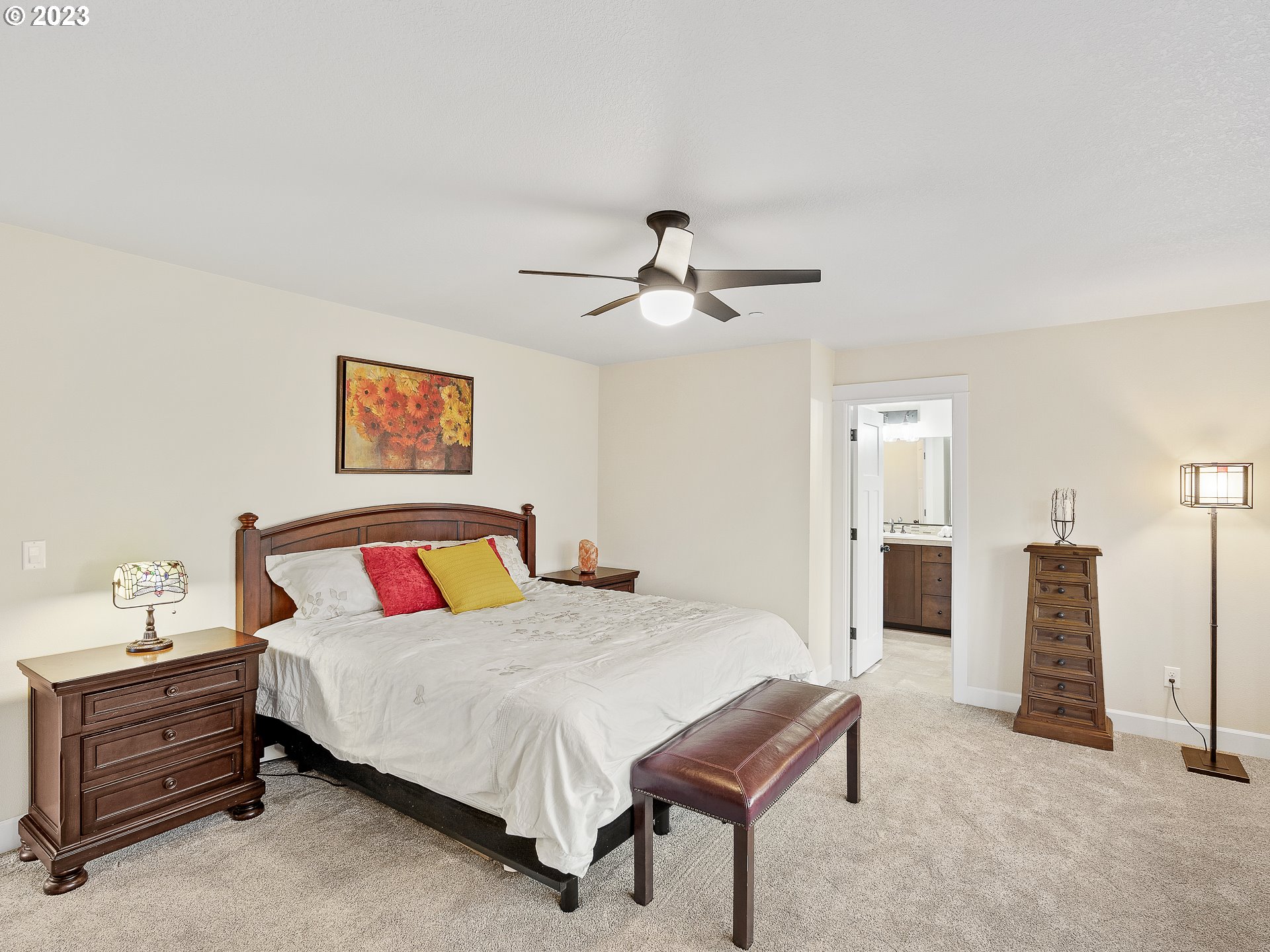 5420 Northwest 15th Circle Camas, WA 98607 - Photo 14 of 29 a bedroom with a bed and a chandelier