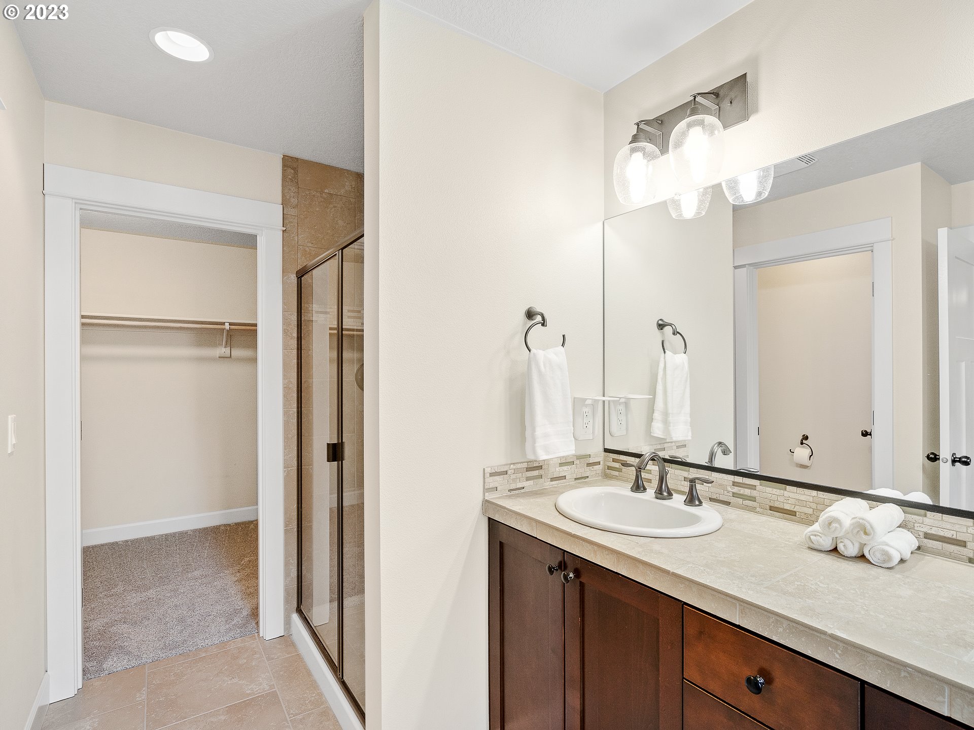 5420 Northwest 15th Circle Camas, WA 98607 - Photo 17 of 29 a bathroom with a sink vanity and a mirror