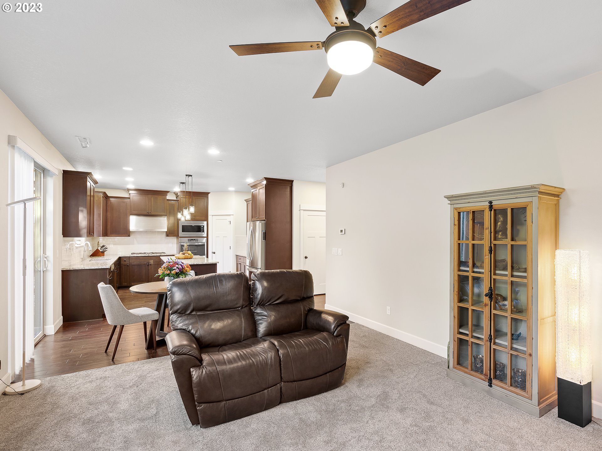 5420 Northwest 15th Circle Camas, WA 98607 - Photo 9 of 29 a view of a livingroom with furniture and a ceiling fan