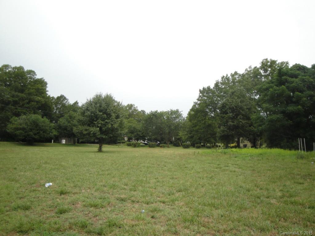 0 China Grove Church Road Pineville, NC 28134 - Photo 1 of 13 a view of a field with a trees in the background