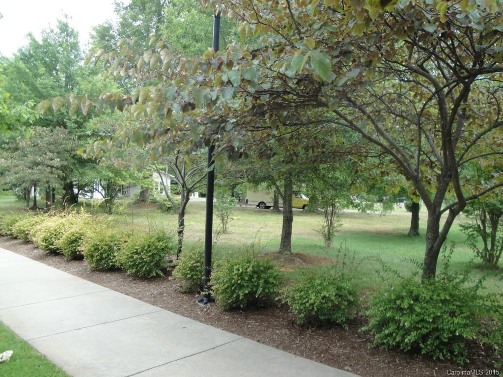 0 China Grove Church Road Pineville, NC 28134 - Photo 7 of 13 a backyard of a house with lots of green space