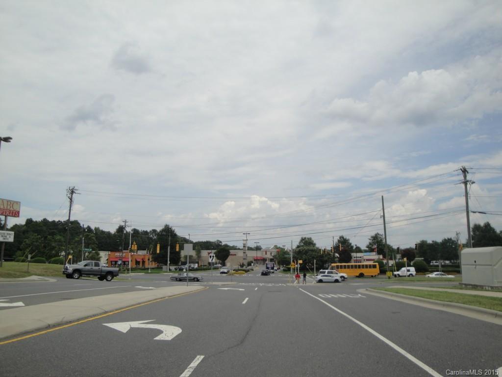 0 China Grove Church Road Pineville, NC 28134 - Photo 8 of 13 a city street with cars and trees