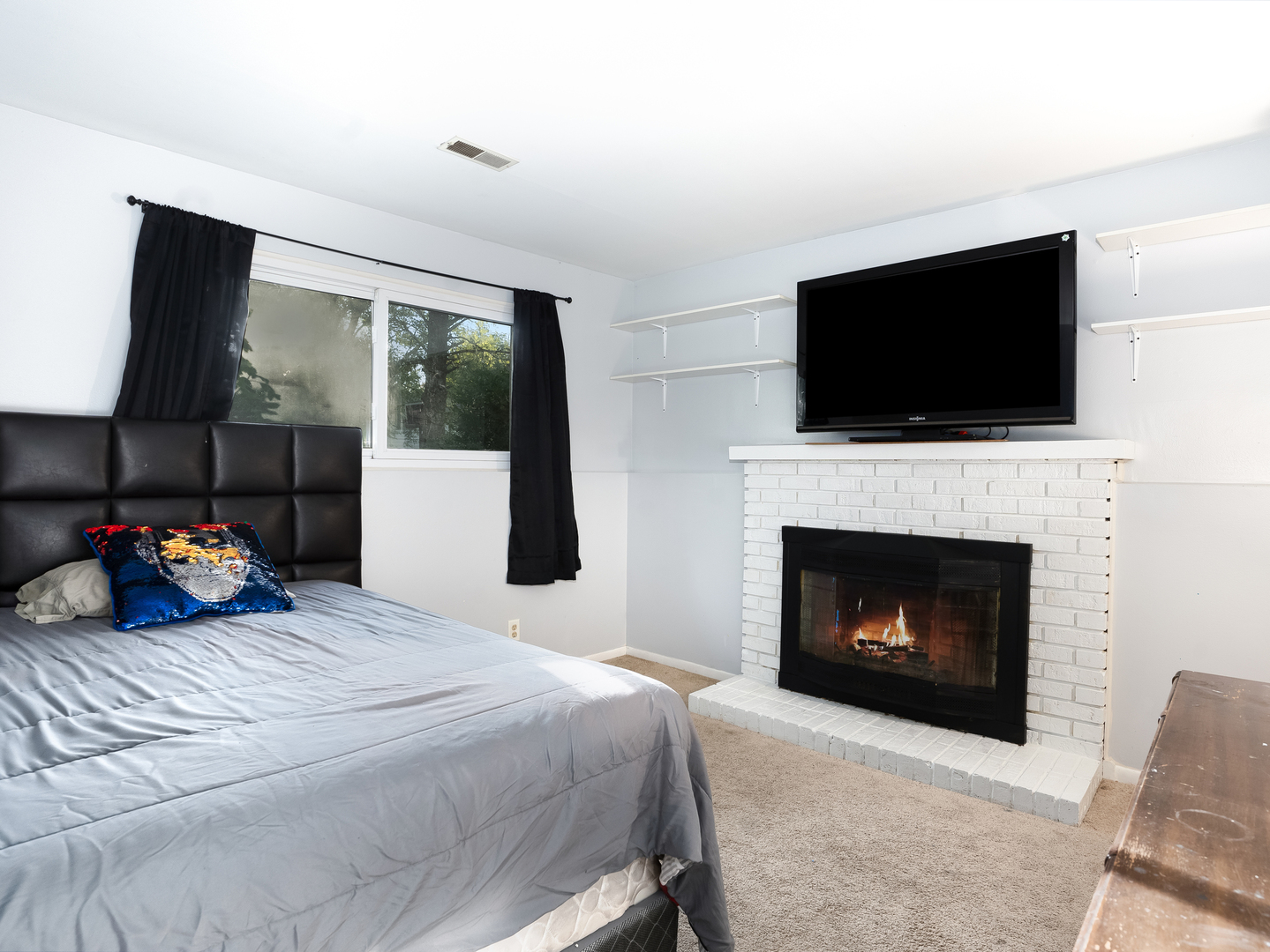 156 Bedford Road Bolingbrook, IL 60440 - Photo 11 of 16 a bedroom with a bed and a flat screen tv