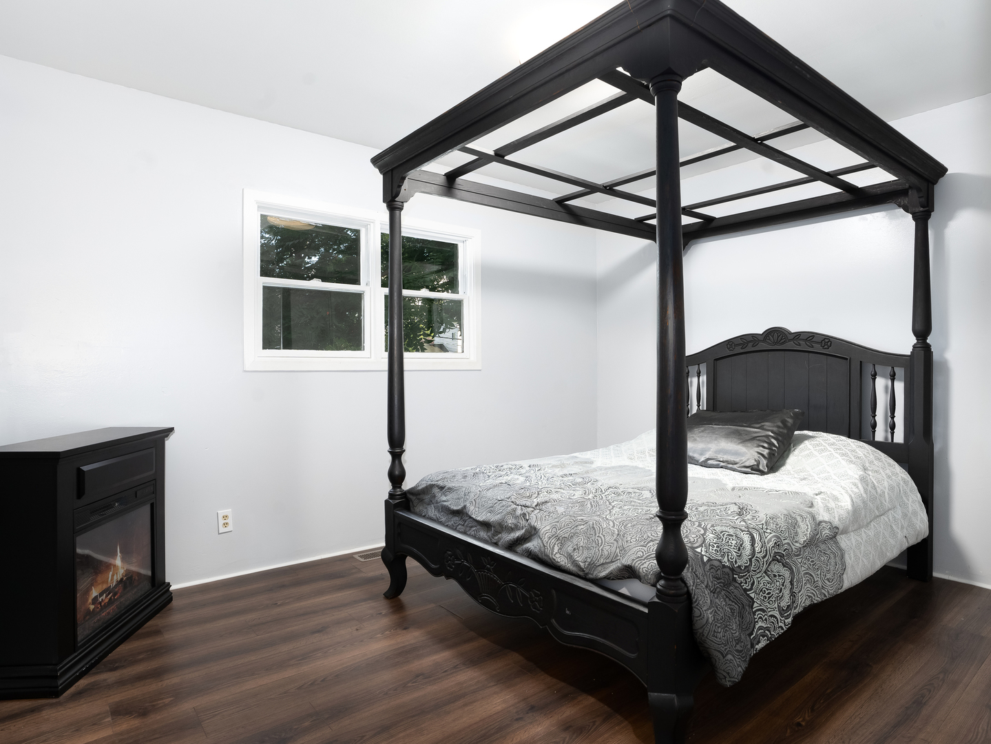 156 Bedford Road Bolingbrook, IL 60440 - Photo 8 of 16 a bedroom with a bed and wooden floor