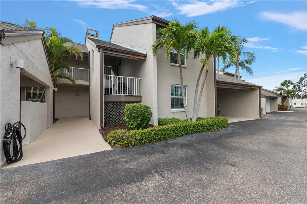 4633 Duhme Road, Unit 1D St. Petersburg, FL 33708 - Photo 1 of 1 a view of a house with a yard
