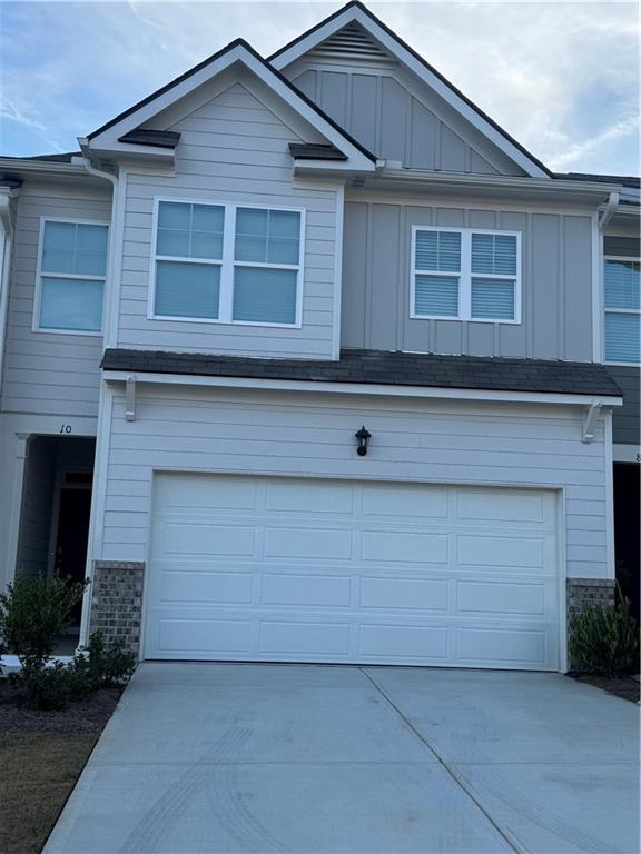 a view of house with backyard space