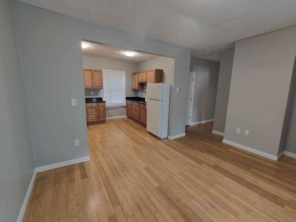 30 Vine Street, Unit 2 Haverhill, MA 01830 - Photo 12 of 13 a view of a kitchen from the hallway
