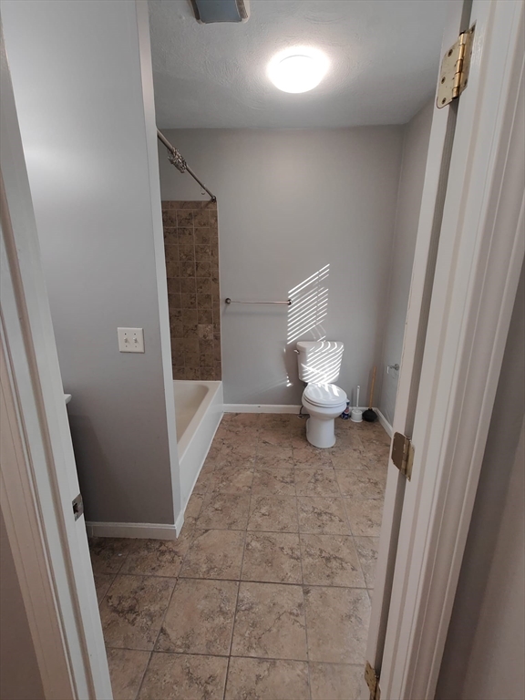 30 Vine Street, Unit 2 Haverhill, MA 01830 - Photo 8 of 13 a view of a hallway with toilet