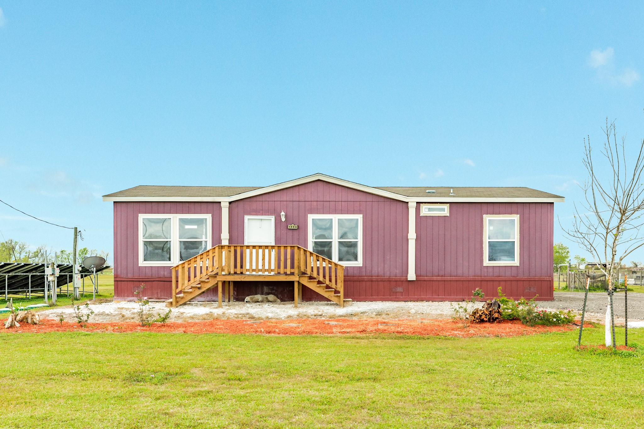 1886 County Road 212 Angleton, TX 77515 - Photo 6 of 36 a front view of a house with a yard