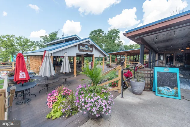 a view of a chairs and table in the patio