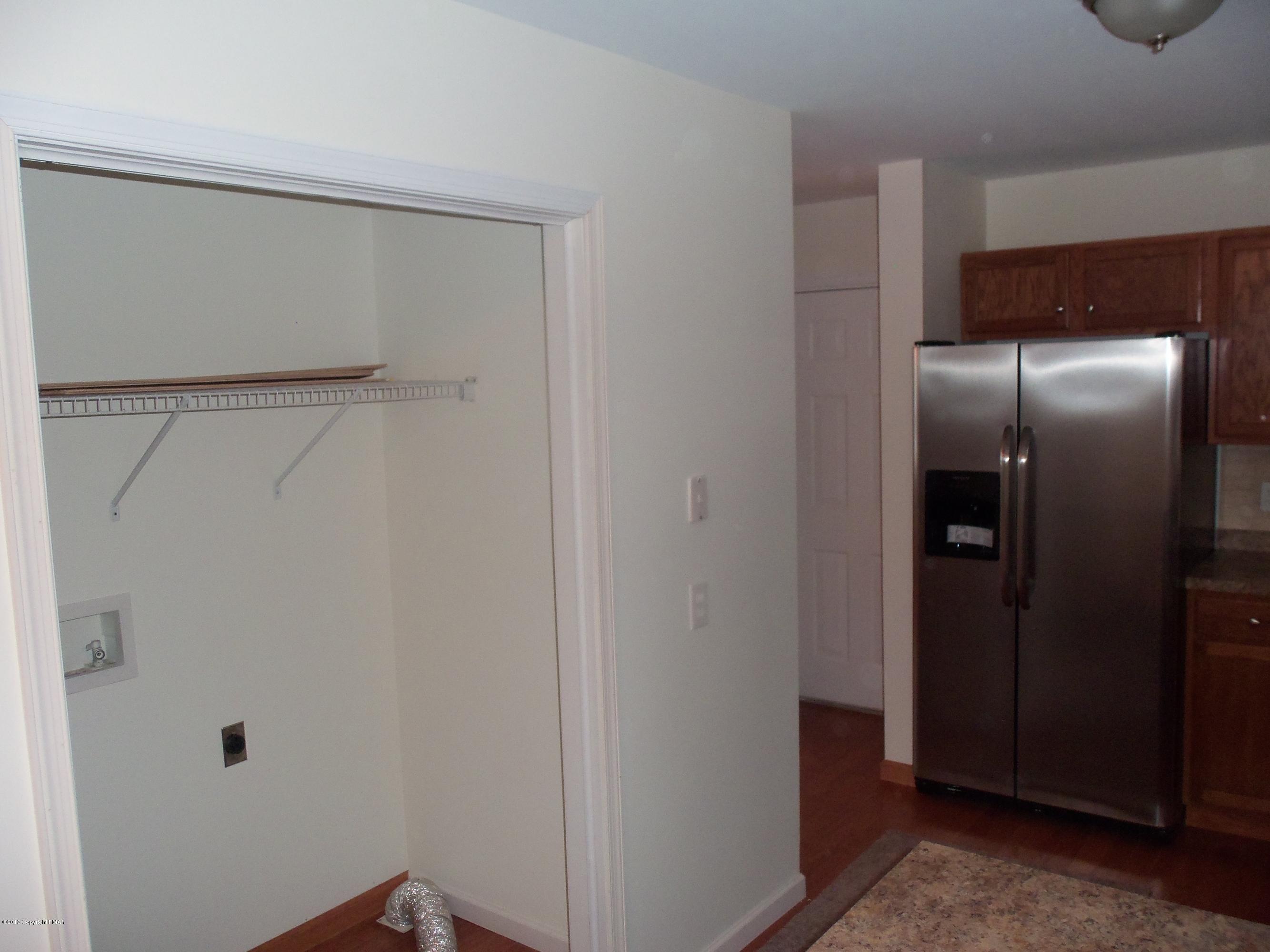 4153 Romeo Road Tobyhanna, PA 18466 - Photo 11 of 41 a bathroom with a glass shower door