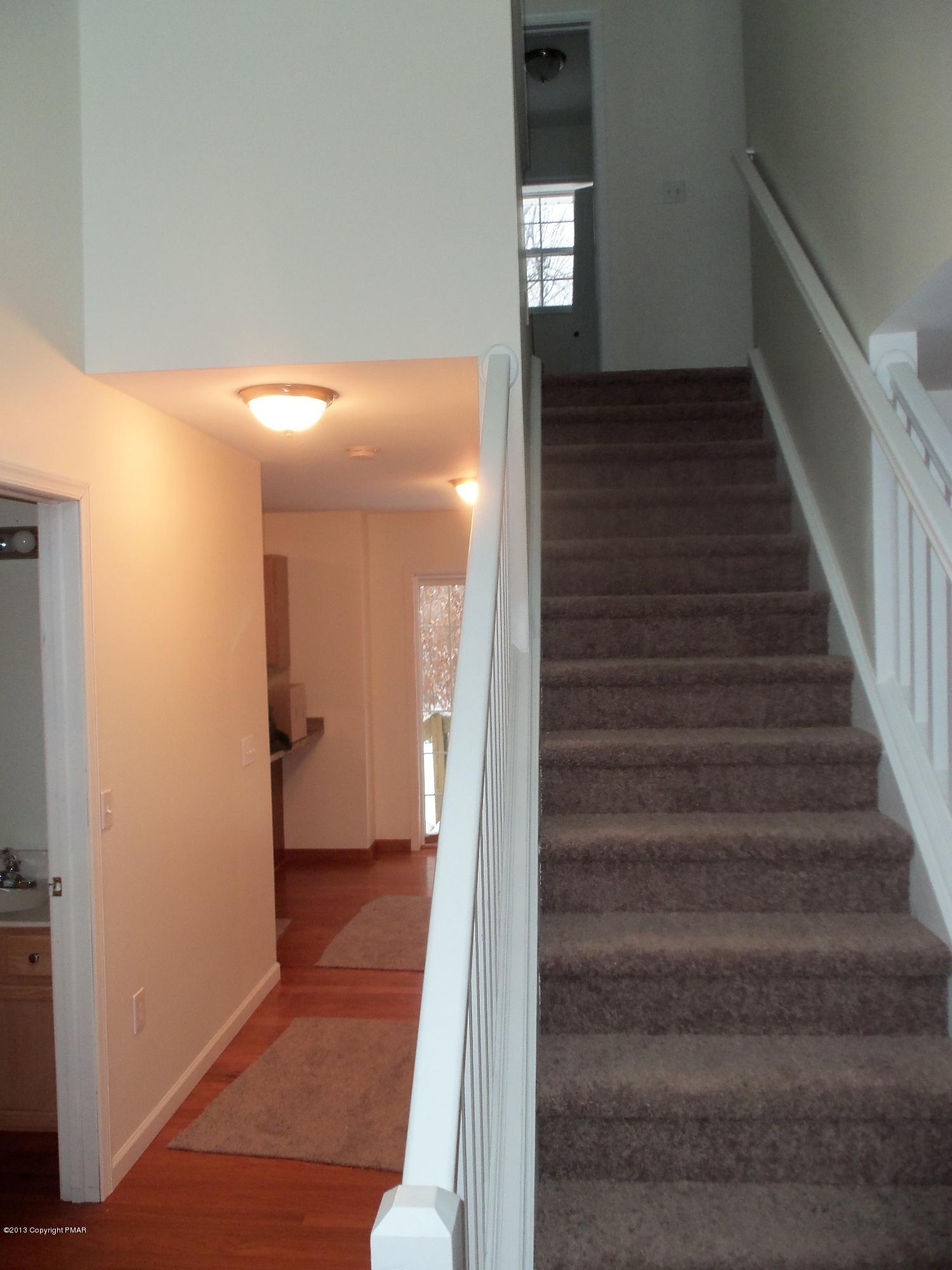 4153 Romeo Road Tobyhanna, PA 18466 - Photo 18 of 41 a view of entryway and hall with wooden floor
