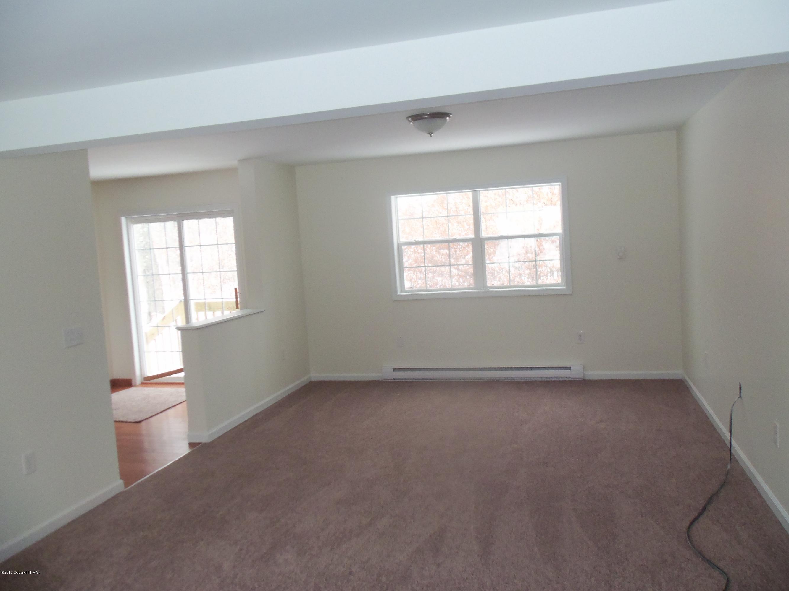 4153 Romeo Road Tobyhanna, PA 18466 - Photo 3 of 41 a view of an empty room with a window