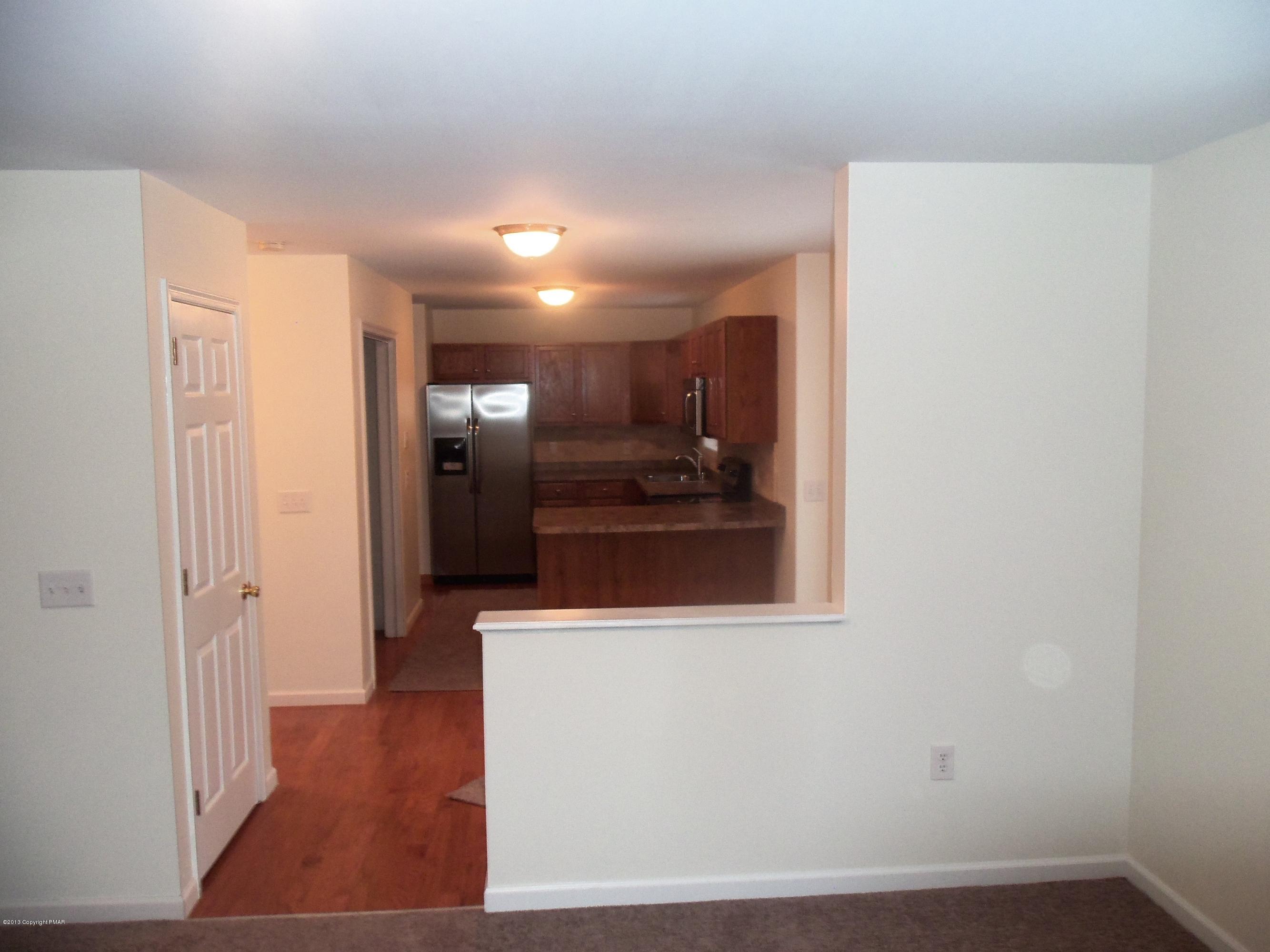 4153 Romeo Road Tobyhanna, PA 18466 - Photo 6 of 41 a view of a kitchen from the hallway
