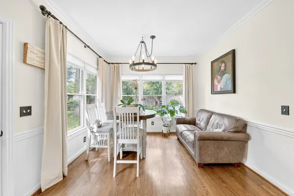 a living room with furniture and windows