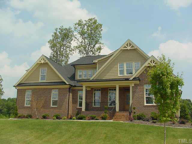 406 Waterville Street Raleigh, NC 27603 - Photo 1 of 10 front view of a house with a yard