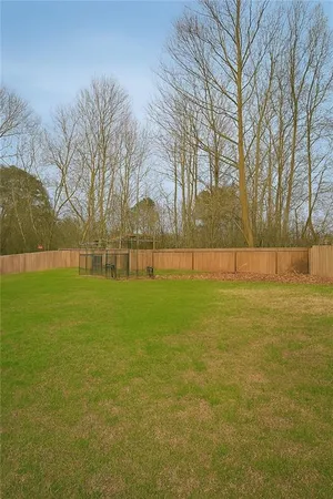 a view of yard and trees