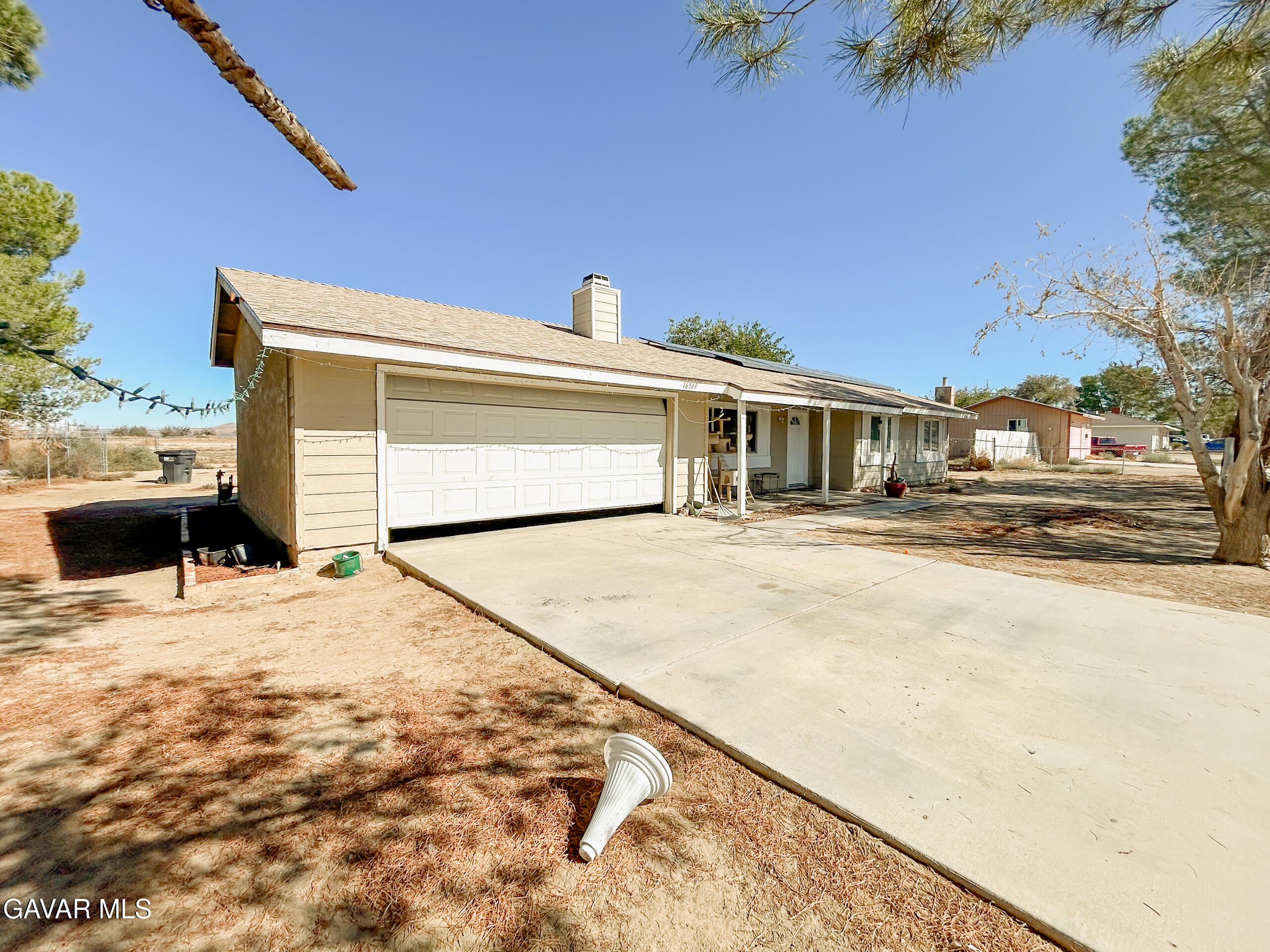 16549 Mossdale Avenue Lake Los Angeles, CA 93535 - Photo 19 of 23 a view of a house with a outdoor space
