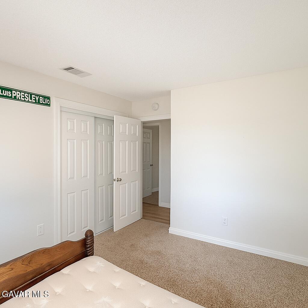 16549 Mossdale Avenue Lake Los Angeles, CA 93535 - Photo 8 of 23 a view of a room with an empty space