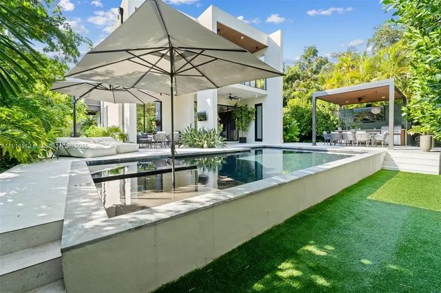 a view of a house with a swimming pool