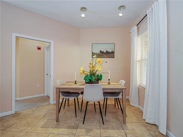 a view of a dining room with furniture