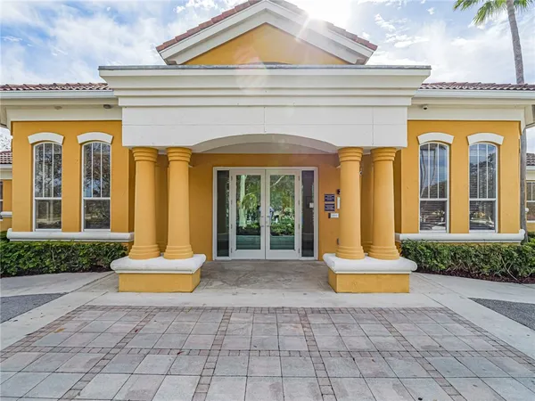 a view of entrance front of house with yard